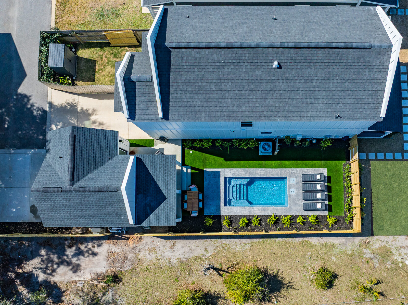 Aerial view of a custom ADU and pool built by The AJAC Group, Pensacola FL