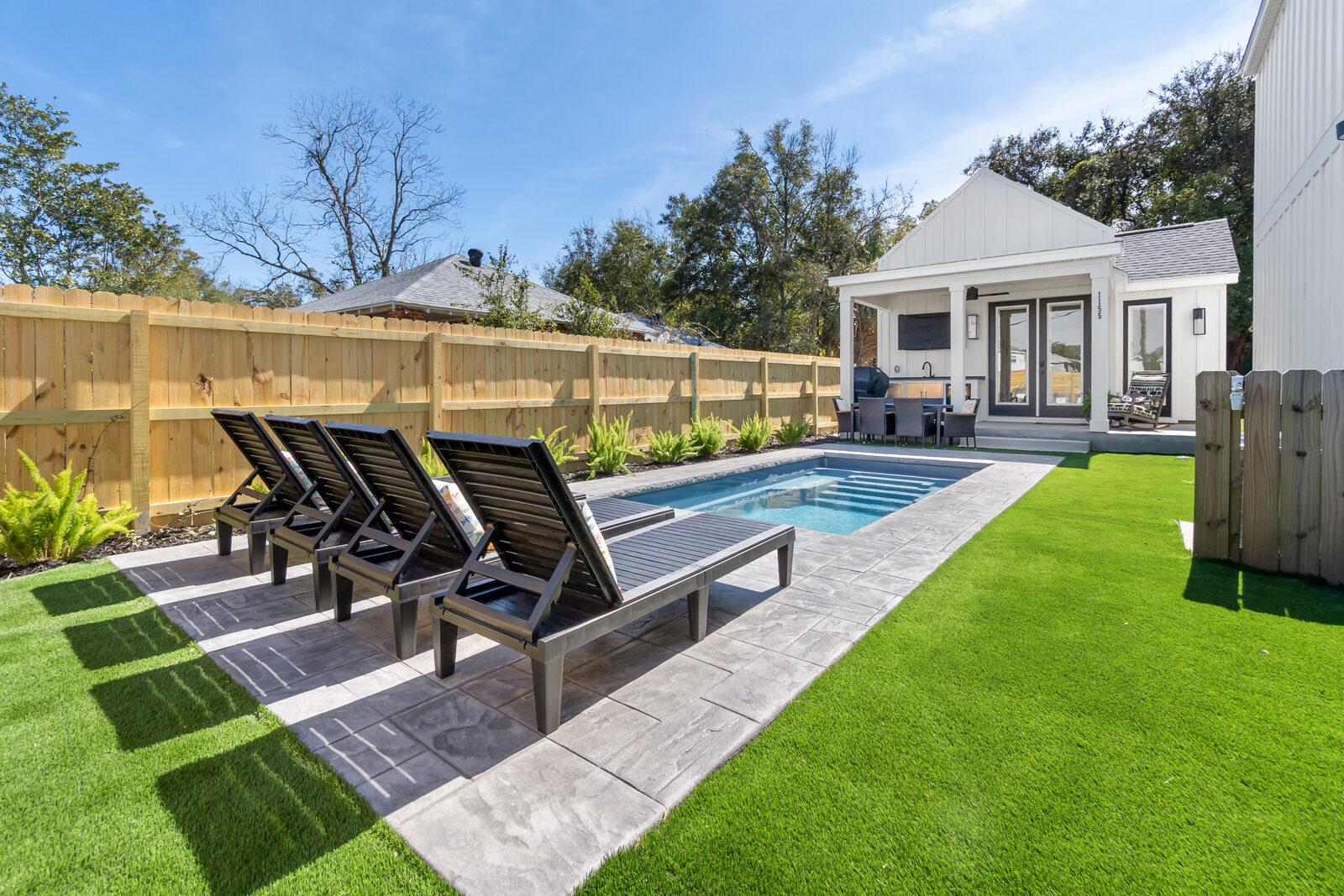 Custom ADU and pool house built by The AJAC Group in Pensacola, FL